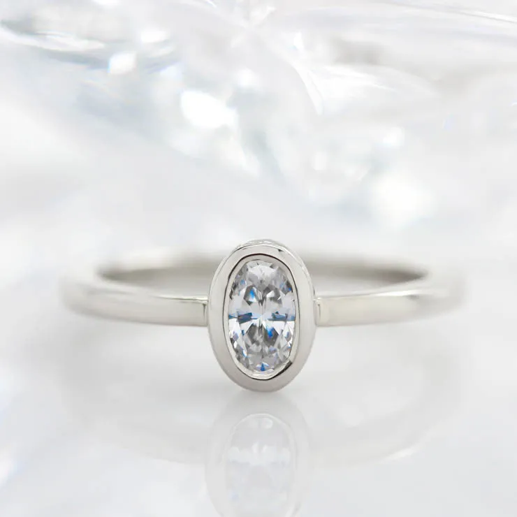 Dainty Bezel Set Oval Solitaire Engagement Ring   - Olivia