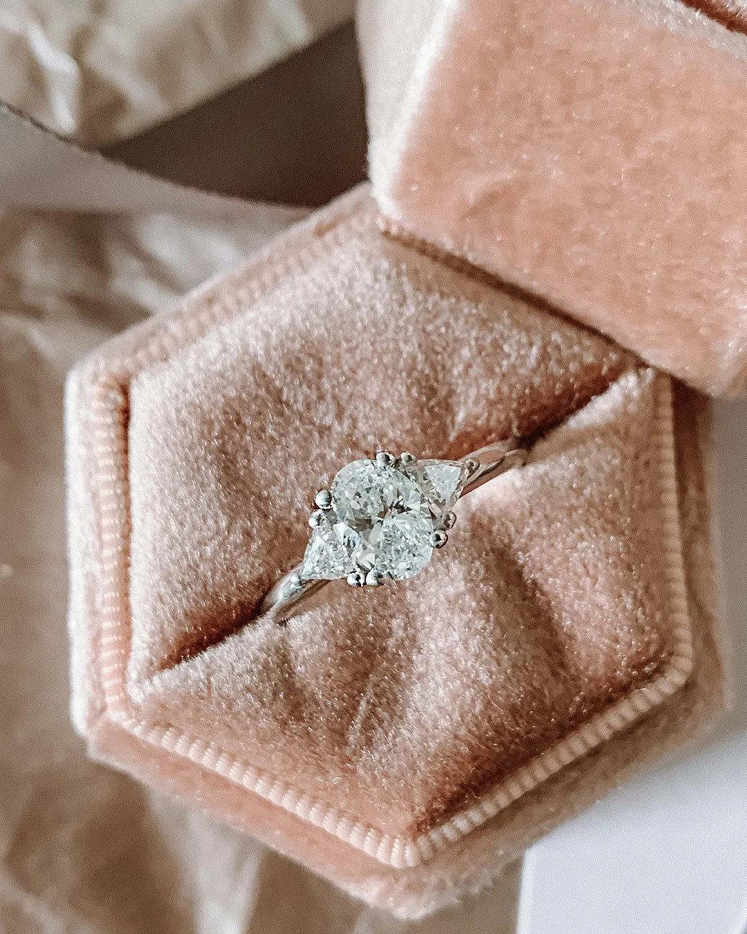 Niva Engagement Ring with Oval Cut and Triangle Cut Natural Diamonds