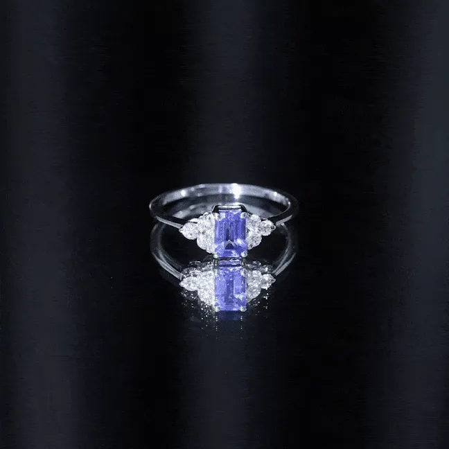 Octagon Cut Tanzanite Solitaire Ring with Diamond Trio