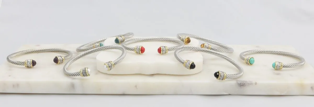 Rope cuff bracelet with gold inlay and colored gemstone