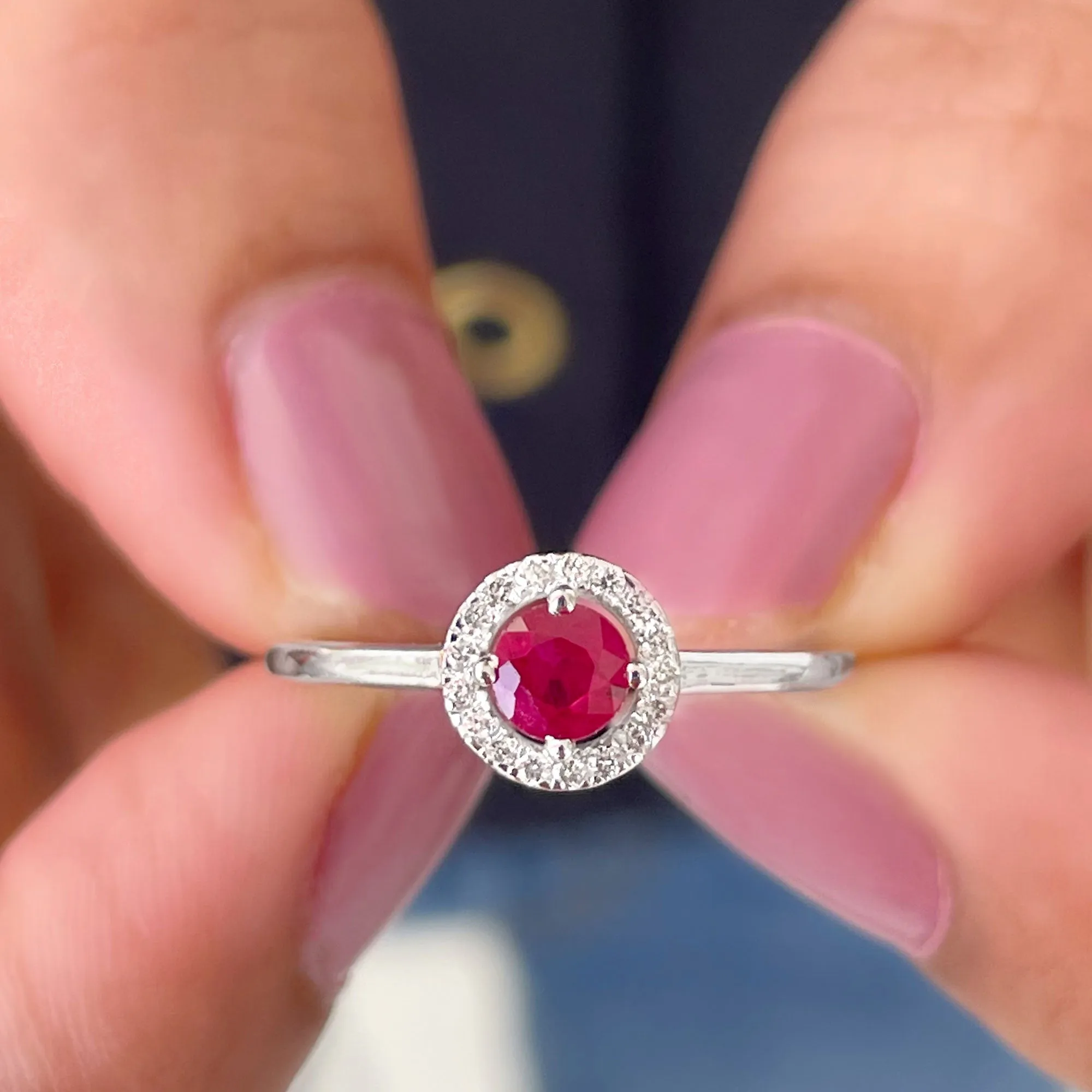 Round Ruby Engagement Ring with Diamond Halo