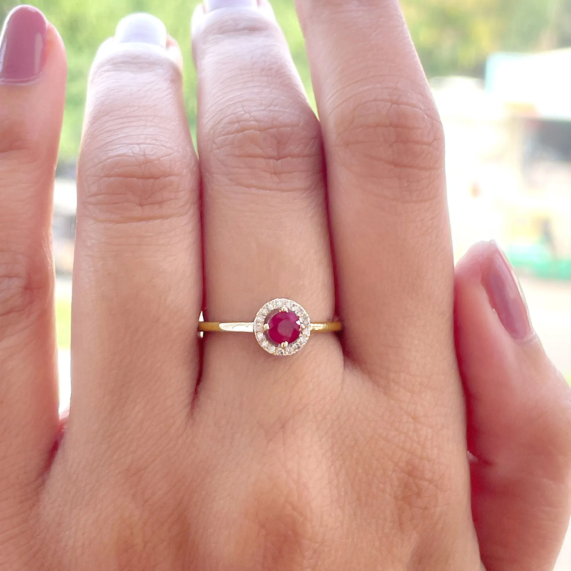 Round Ruby Engagement Ring with Diamond Halo