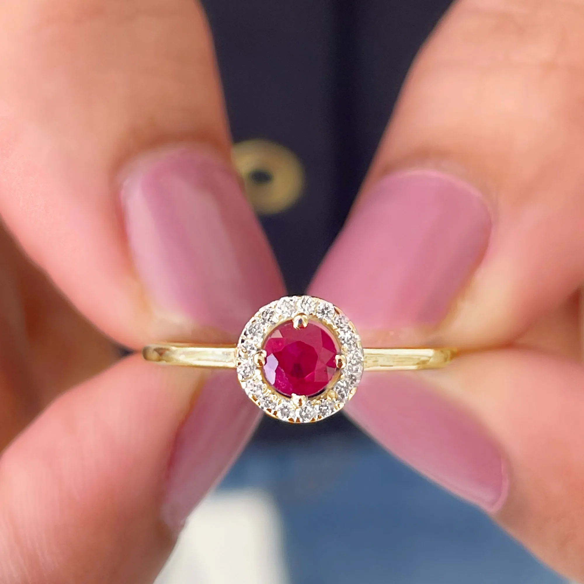 Round Ruby Engagement Ring with Diamond Halo